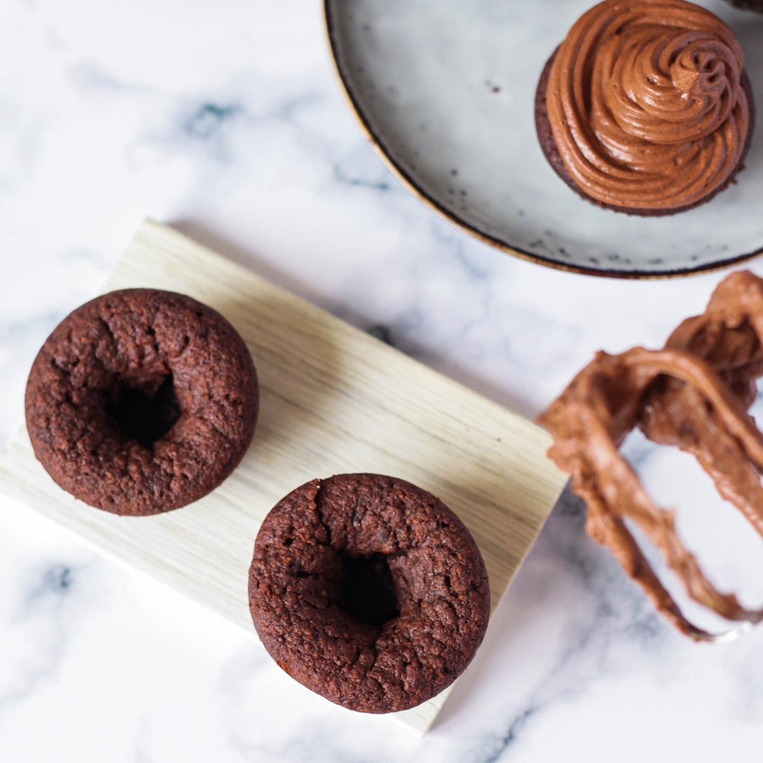 Make healthy chocolate cupcakes with no sugar chocolate frosting.